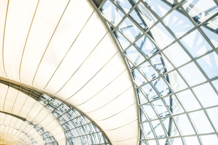a glass ceiling with a white roof